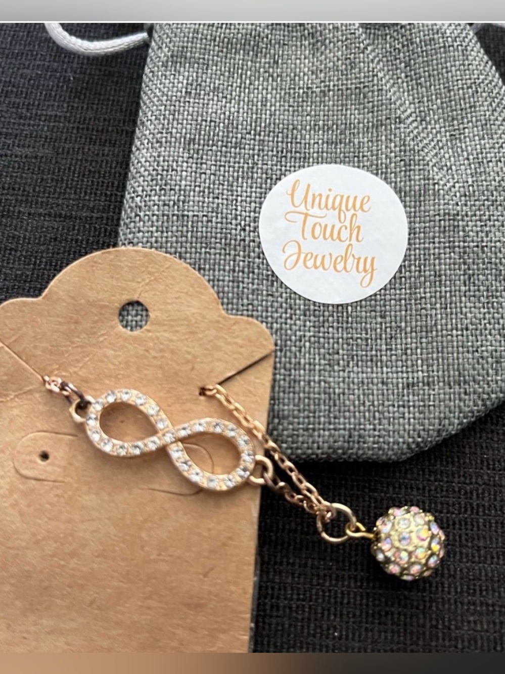 Gold coloured Infinity Necklace with Crystal Ball Pendant by